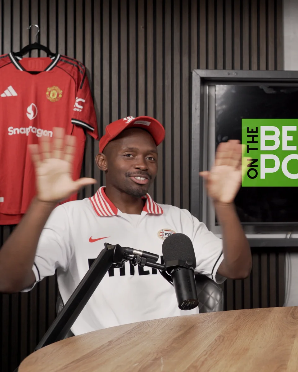 Jordan Antonio Brown on the On the Bench podcast in a PSV shirt and red cap
